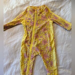 Swim Zip spf 50 0-6 month sun bathing suit. Full protection. Cutest pattern.